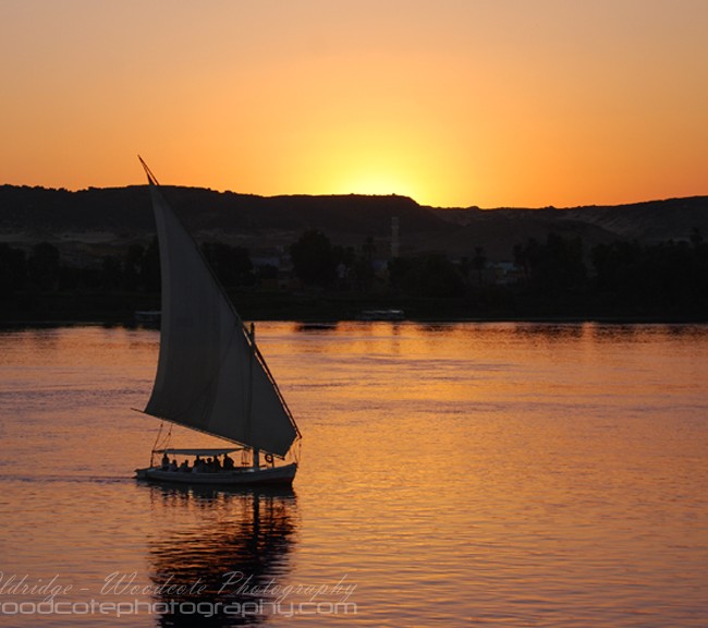 Local Felucca returning home on Nile river